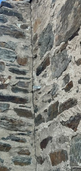 Deterioration in pointing on the front of the building
