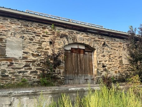 Rear of building, concrete-covered opening