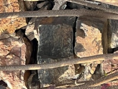 Holes, cracks, and deterioration along the stonewall